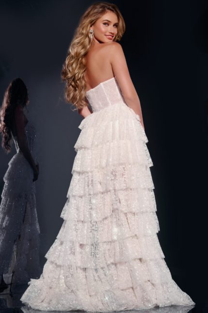 model wearing Jovani 40031 off-white gown, back view