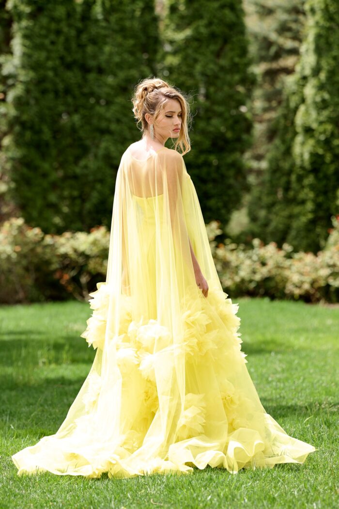 Model wearing Yellow Tulle Strapless Gown with Floral Appliqués 40092