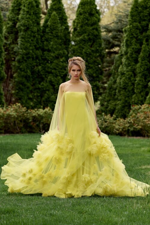 Model wearing Yellow Tulle Strapless Gown with Floral Appliqués 40092