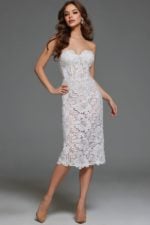 Model wearing Jovani 40156 white strapless lace dress from the front