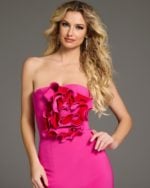 Model wearing Jovani 40215 fuchsia dress close-up highlighting floral detail.