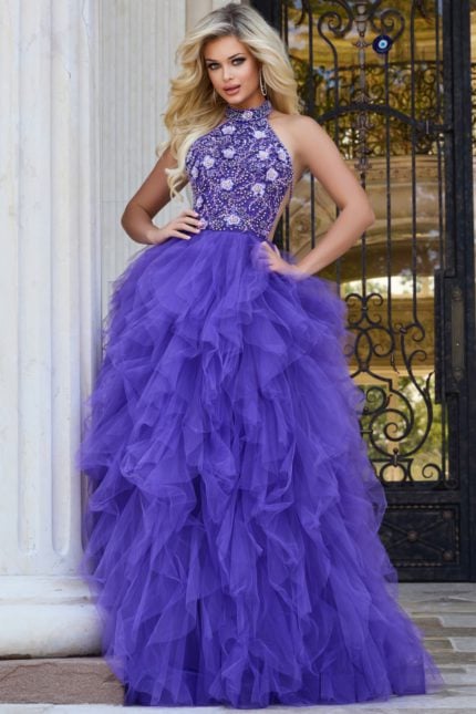 Model wearing Jovani 40218 lilac gown with halter neckline and full tulle skirt.