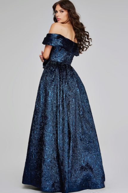 Model wearing Jovani 40288 navy ball gown, back view.