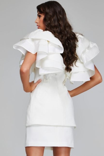 Model wearing Jovani 40292 ivory dress with ruffled sleeves, back view.