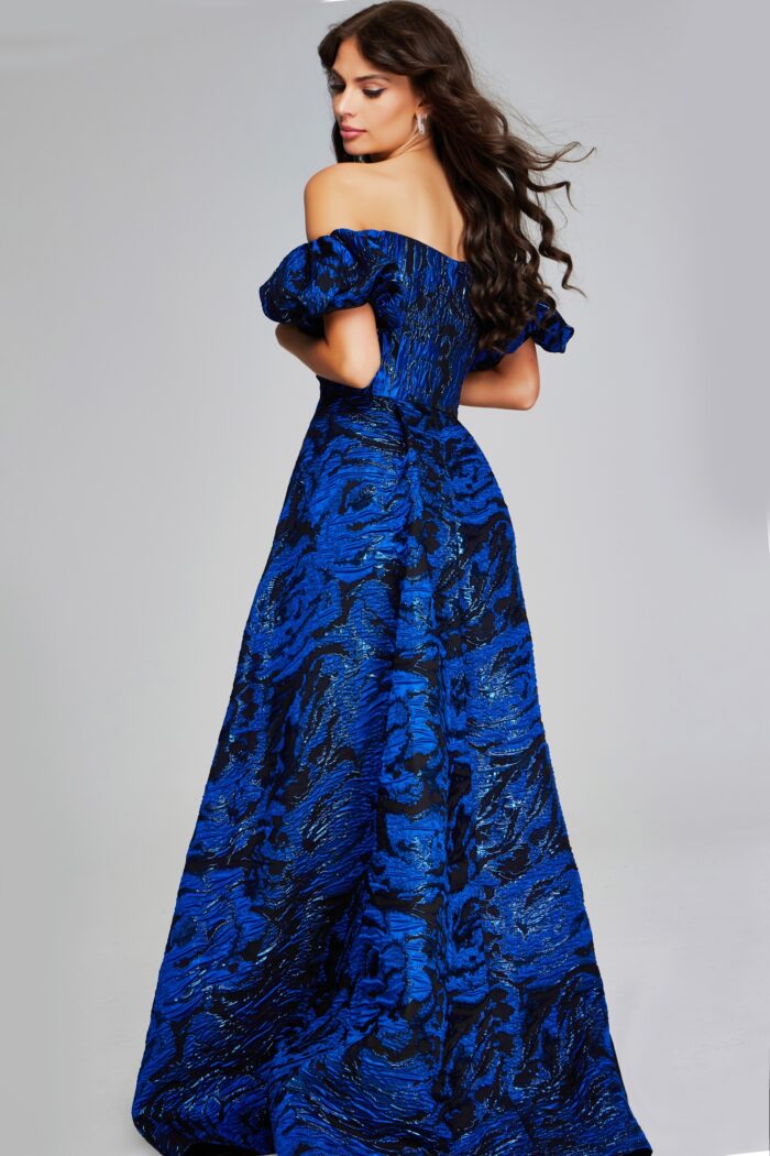 Model wearing Striking Royal Blue and Black Off-Shoulder Gown with Puff Sleeves 40315