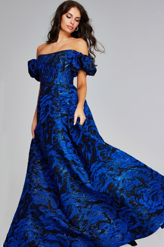 Model wearing Striking Royal Blue and Black Off-Shoulder Gown with Puff Sleeves 40315