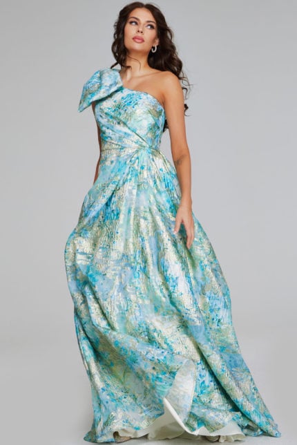 Model wearing Jovani 40317 mint multi dress with one-shoulder neckline and bow detail.