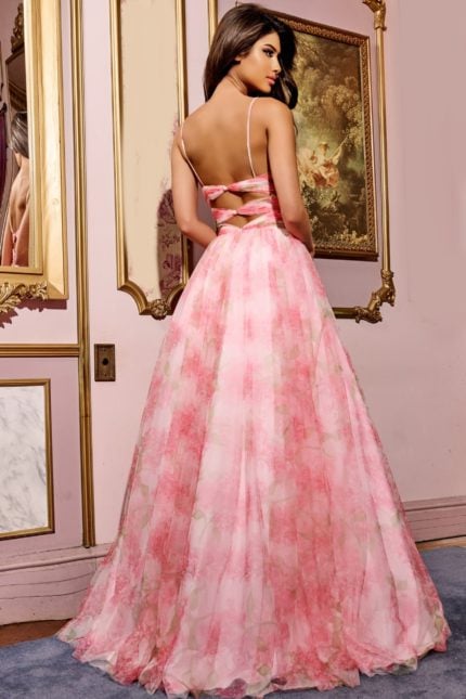 Model wearing Jovani 40402 pink floral A-line gown, back view.