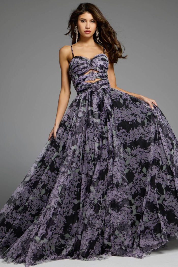 Elegant floral print gown with cutout details and flowing skirt