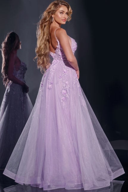 Model wearing Jovani 40472 lilac gown, showing back detail with floral appliques.