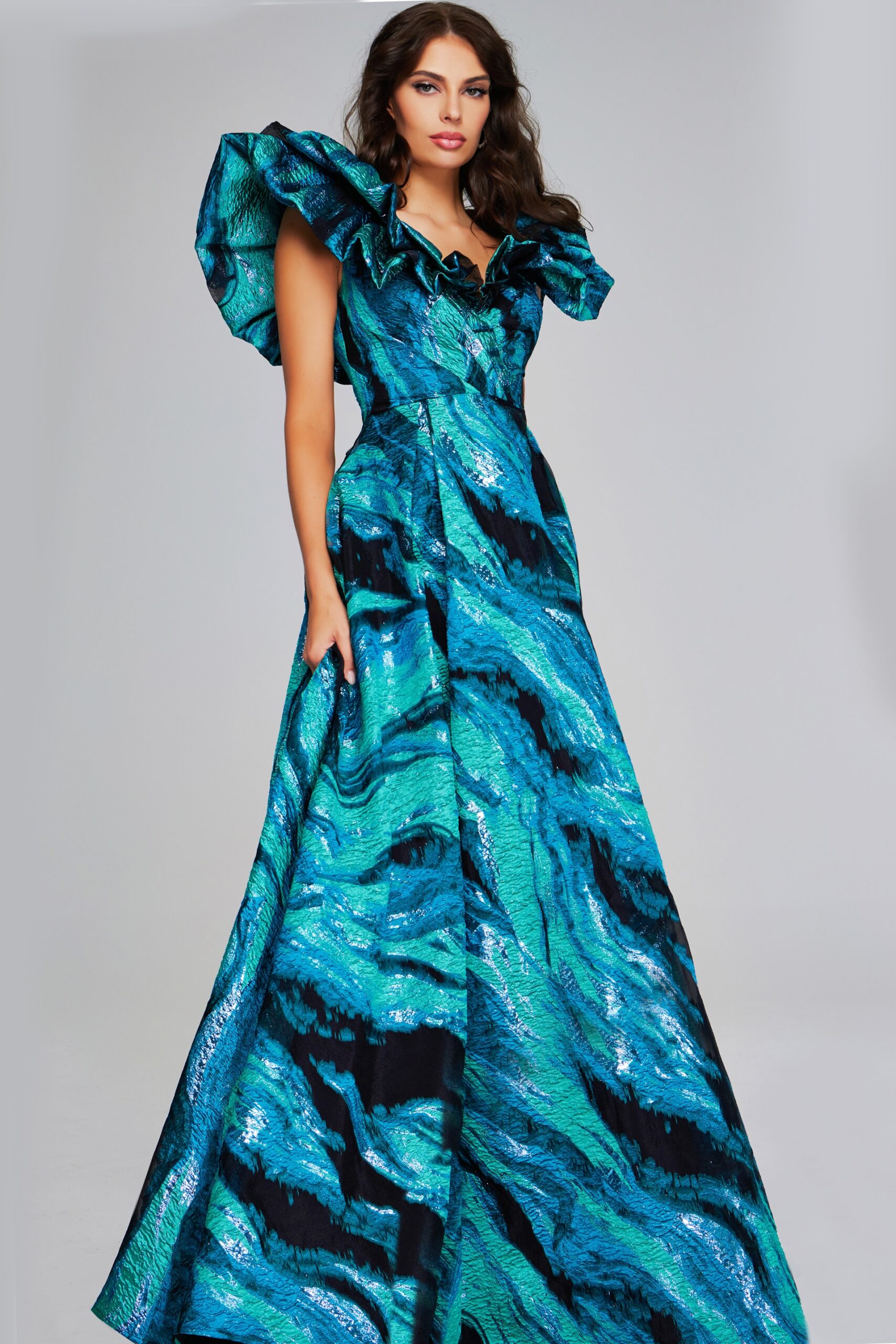 Model wearing Vibrant Teal Multi-Print Gown with Ruffled V-Neckline 40696