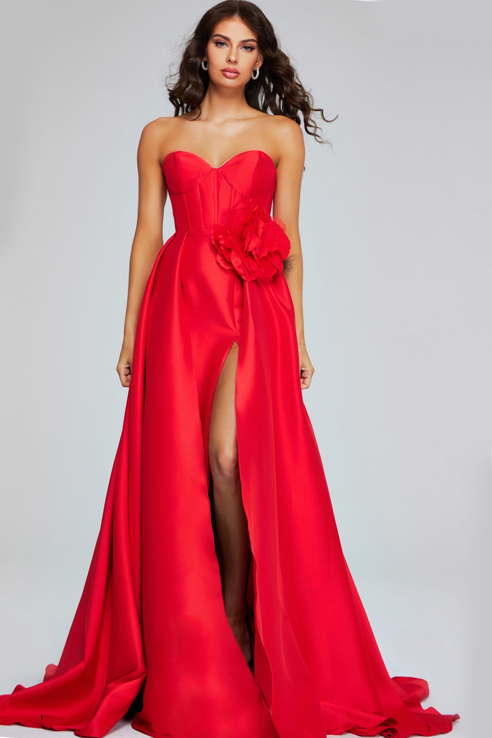 Model wearing Stunning Red Strapless Gown with High Slit and Floral Accent 40826