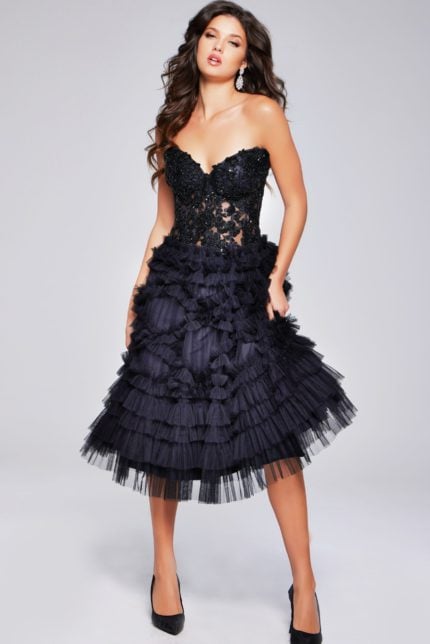 Model wearing Jovani 40854 black cocktail dress with sweetheart neckline and tiered tulle skirt, front view.