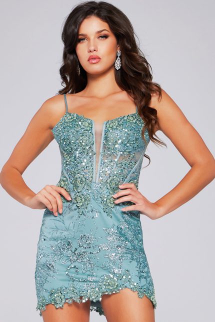 Model wearing Jovani 40922 green mini dress with sequin embellishments and sweetheart neckline.