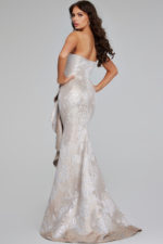 model wearing Jovani 42028 champagne beige gown back view