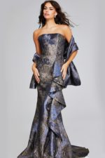 model wearing Jovani 42028 gunmetal gray gown with wrap