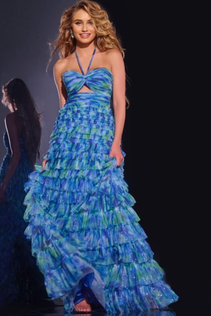 Model wearing Jovani 42182 royal dress with ruffled A-line silhouette, front view.