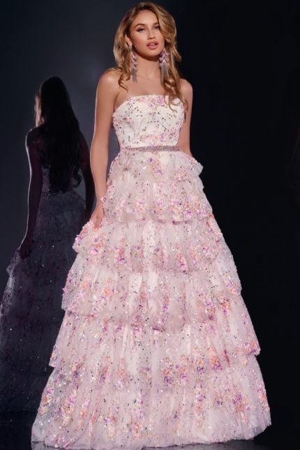 Model wearing Jovani 42190 white dress with floral embellishments and sequins, front view.