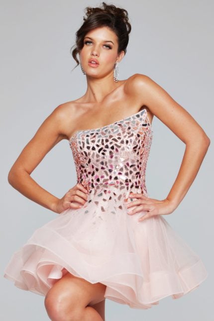 Model wearing Jovani 42282 pink short dress with one-shoulder design.