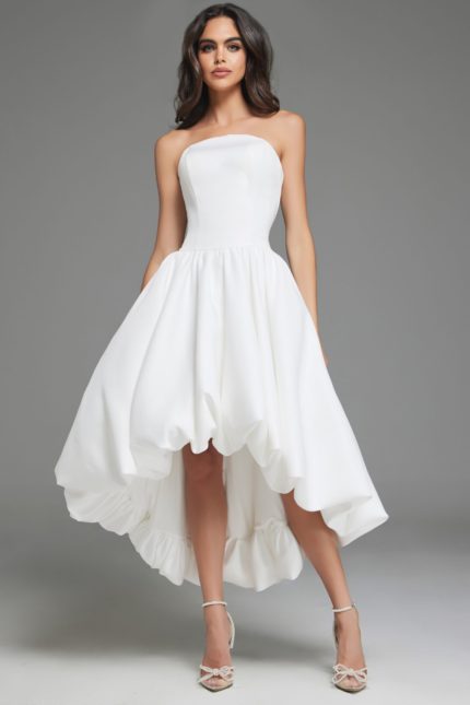 Model wearing Jovani 42345 off-white high-low dress, front view