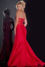 Back view of model wearing Jovani 42375 red gown with flowing skirt.