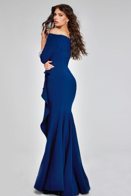 Model showing the back of Jovani 42409 navy gown.