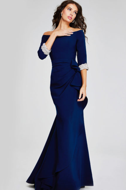 Model wearing Jovani 42409 navy gown with off-the-shoulder neckline from the front view.