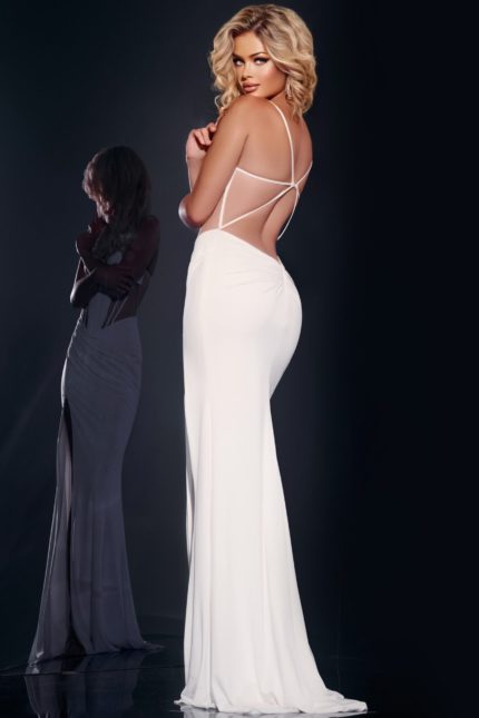 model wearing Jovani 42534 gown with open back and elegant fit