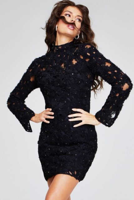 Model wearing Jovani 42576 black dress, showcasing detailed floral appliqués and high neckline.