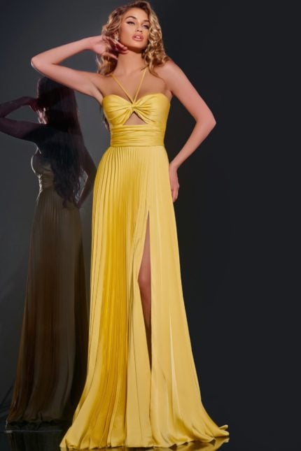 Model wearing Jovani 42971 elegant yellow dress with twist-front bodice, front view.