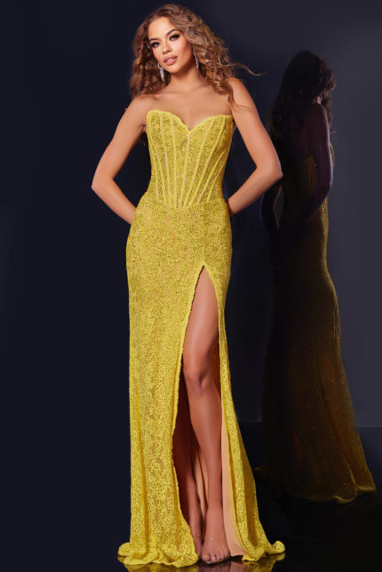 Model wearing Jovani 43093 yellow gown with sweetheart neckline and high slit from the front.