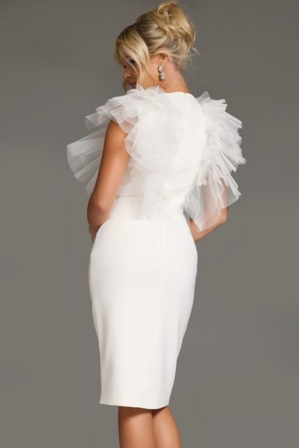 Model wearing Jovani 43152 white dress with ruffle detail, back view