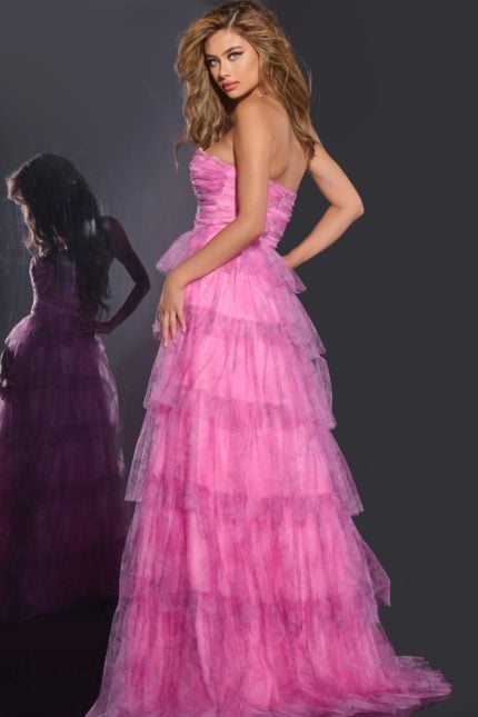 Model wearing Jovani 43170 pink dress, back view showing layered tulle.