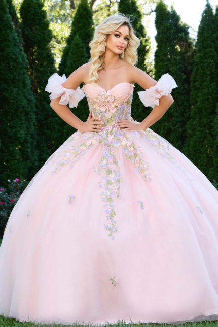 Model wearing Jovani 43231 lilac ball gown with floral appliqués and off-the-shoulder neckline.