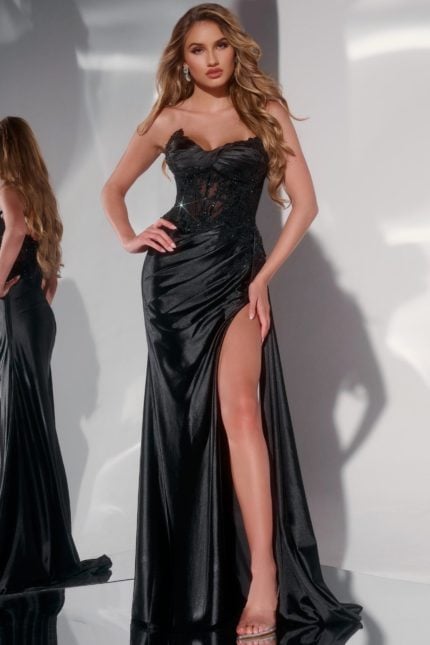 Model wearing Jovani 43848 black evening gown with sweetheart neckline and high slit, front view.