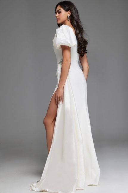 model wearing Jovani 44299 white one-shoulder gown side-back view