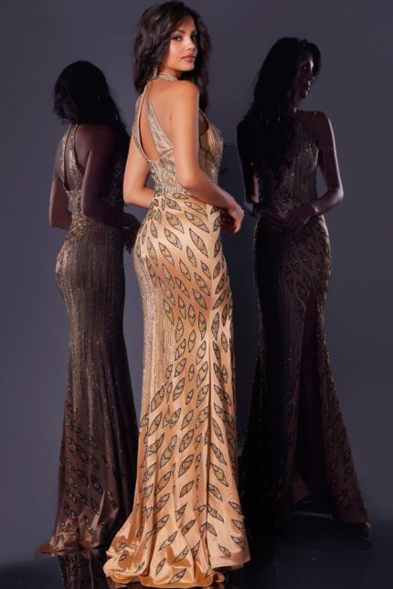 Back view of model in Jovani 44584 gold gown with open back design.