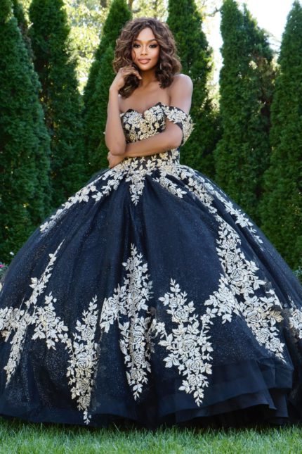 Model wearing Jovani 44900 ball gown with floral embellishments front view