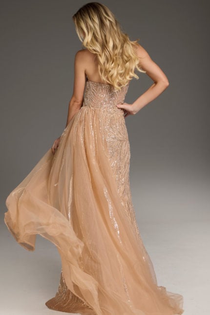 Back view of Jovani 45071 beige gown with flowing skirt