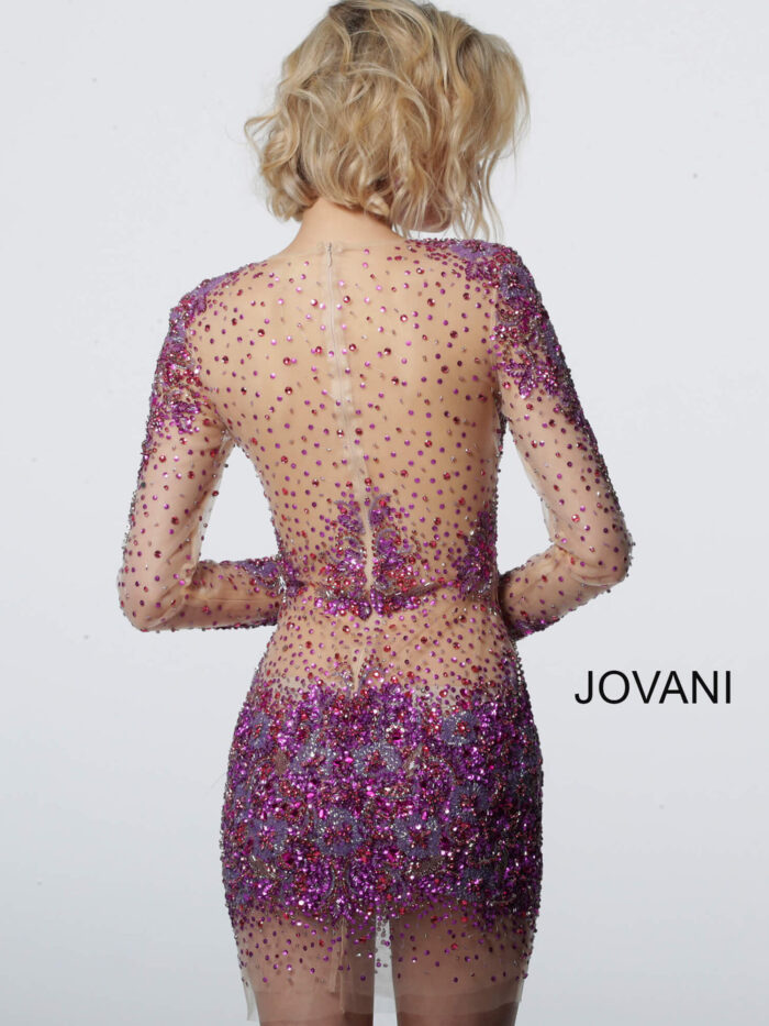 Model wearing Jovani 47598 Nude Fuchsia Sheer Beaded Long Sleeve Short Dress 
