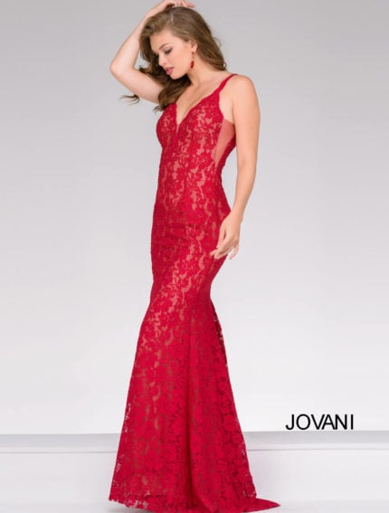 Model wearing Jovani 48994 in red lace with V-neckline and floor-length.