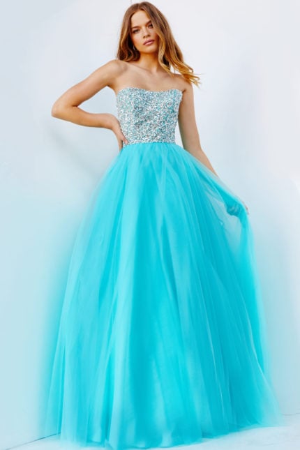 Model wearing Jovani 52131, a blue strapless gown with a sparkling bodice and tulle skirt.