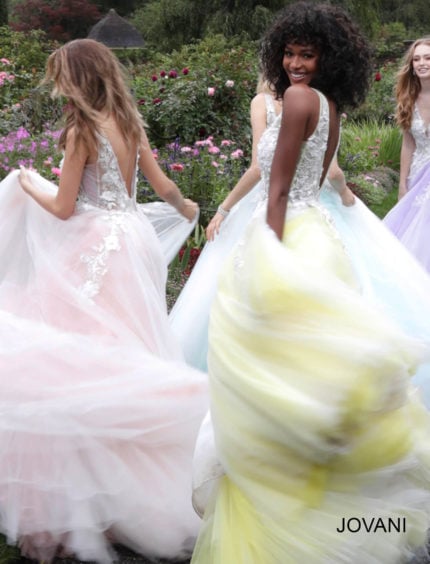 Back view of model wearing Jovani 55634 yellow dress.