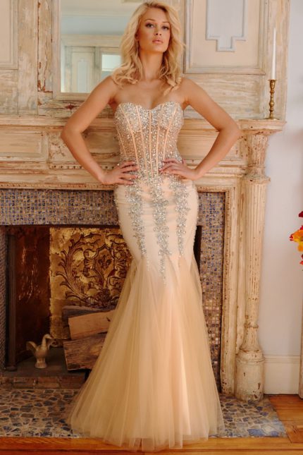 Model wearing Jovani 5908 beige gown with intricate beaded embellishments.