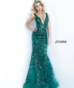 model wearing Jovani 60283 forest green dress with floral applique, front view