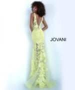 model wearing Jovani 60283 yellow dress with floral applique, back view