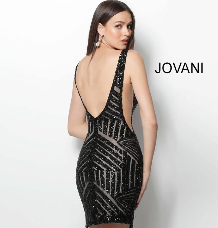 Model wearing Jovani 63899 Form Fitting Embellished Plunging Neck Short Dress 