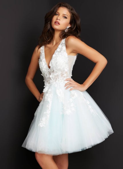 Model wearing Jovani 63987 tea-length A-line dress with floral lace in white.