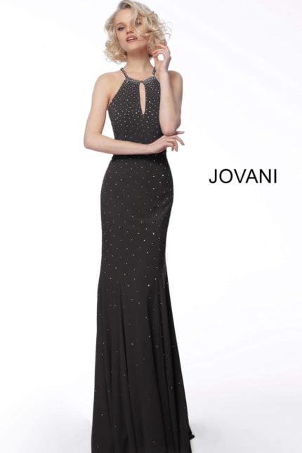 model wearing Jovani 67101 black dress with halter neckline and embellished details