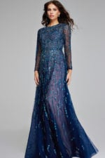 Model wearing Jovani 80807 navy gown, front view highlighting intricate design.